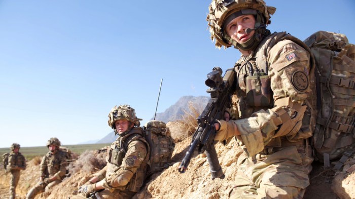 WARNING: Embargoed for publication until: 16/09/2014 - Programme Name: Our Girl Series 1 - TX: n/a - Episode: n/a (No. 1) - Picture Shows:  Mansfield Mike (NICK PRESTON), Smurf (IWAN RHEON) - (C) BBC - Photographer: David Bloomer