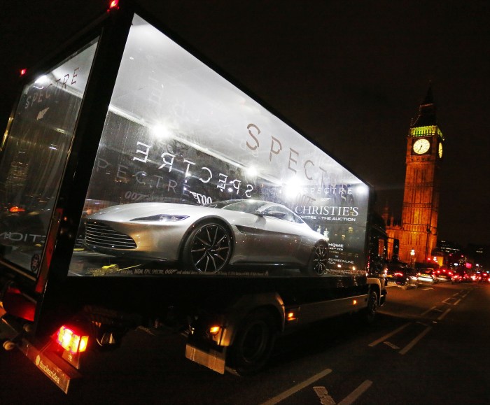An Aston Martin DB10 - one of ten specially designed and engineered for Spectre - begins a 1,000 mile tour of the UK in a glass truck to celebrate the release of the film on Blu-ray and DVD from 22nd February. The DB10, expected to sell for over £1 million in a Christie's charity auction next Thursday, is touring five UK cities from Monday along with fourteen props and costumes. #SpectreAuction